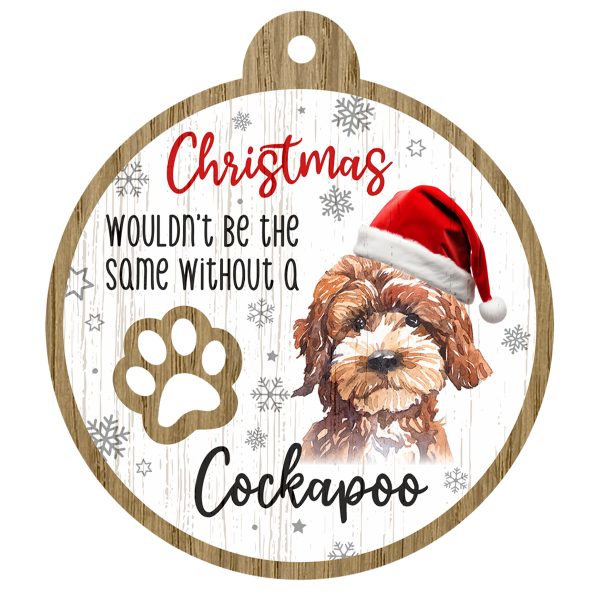 An image of a wooden christmas tree decoration with the wording - Christmas wouldn't be the same without a Cockapoo. There is a picture of the animal.