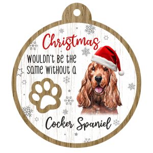 An image of a wooden christmas tree decoration with the wording - Christmas wouldn't be the same without a Cocker Spaniel. There is a picture of the animal.