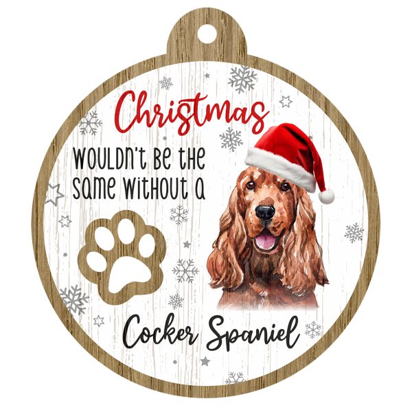 An image of a wooden christmas tree decoration with the wording - Christmas wouldn't be the same without a Cocker Spaniel. There is a picture of the animal.