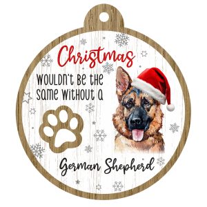 An image of a wooden christmas tree decoration with the wording - Christmas wouldn't be the same without a German Shepherd. There is a picture of the animal.