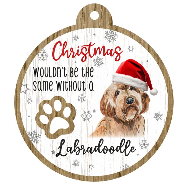 An image of a wooden christmas tree decoration with the wording - Christmas wouldn't be the same without a Labradoodle. There is a picture of the animal.