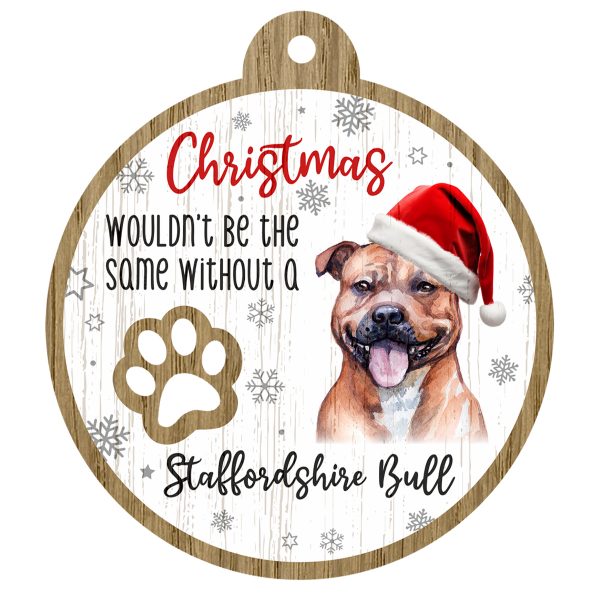 An image of a wooden christmas tree decoration with the wording - Christmas wouldn't be the same without a Staffordshire Bull. There is a picture of the animal.