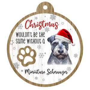An image of a wooden christmas tree decoration with the wording - Christmas wouldn't be the same without a Miniature Schnauzer. There is a picture of the animal.