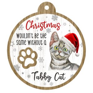 An image of a wooden christmas tree decoration with the wording - Christmas wouldn't be the same without a Tabby Cat. There is a picture of the animal.