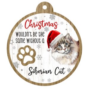 An image of a wooden christmas tree decoration with the wording - Christmas wouldn't be the same without a Siberian Cat. There is a picture of the animal.