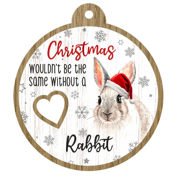 An image of a wooden christmas tree decoration with the wording - Christmas wouldn't be the same without a Rabbit. There is a picture of the animal.