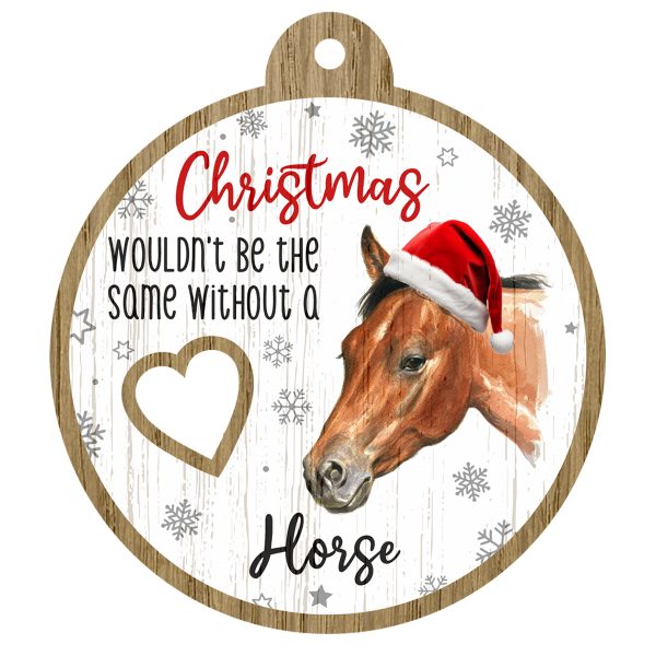 An image of a wooden christmas tree decoration with the wording - Christmas wouldn't be the same without a Horse There is a picture of the animal.